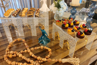 Image Anater Food Riser showing set of 2 sizes acrylic Turkish printed white and gold risers dinning table with food display and decoration