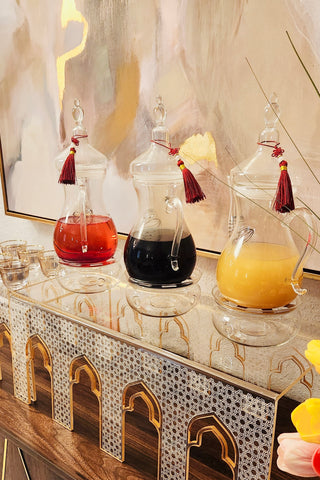 Image 3 Ibreeq a turkish style teapot on Anater food riser and tea cups and flower background.